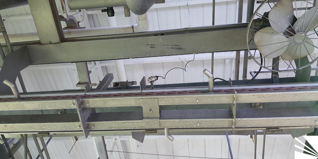 Transportador arreador de canales