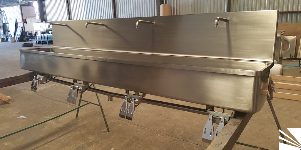 Lavamanos colectivo de pared