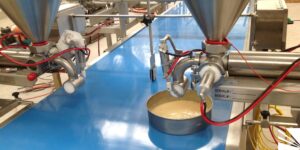 Transportador para llenado de moldes