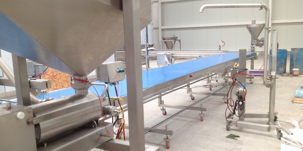 Transportador para llenado de moldes