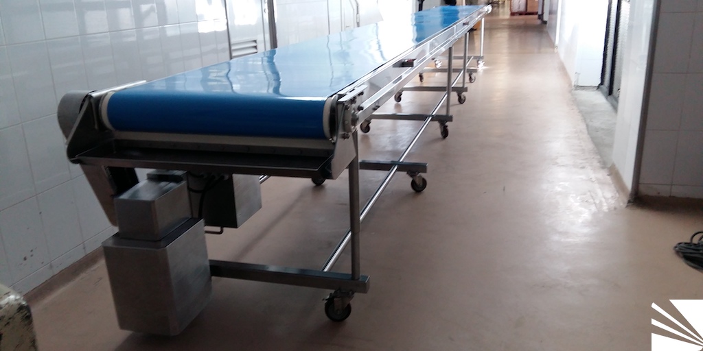 Transportador inoxidable para pasteles